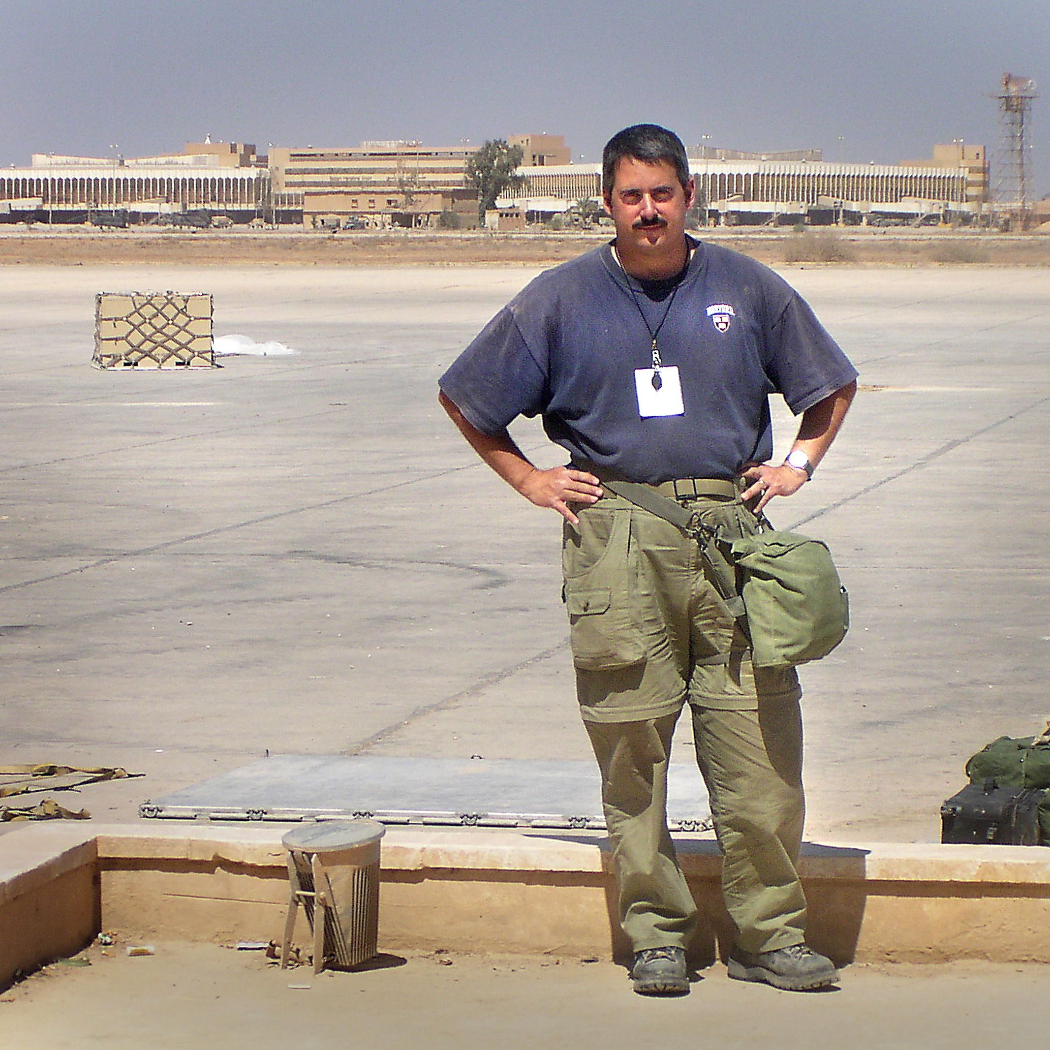 AIRPORT.jpg from Matt Schofield for Metro Kansas City Star reporter Matthew Schofield was embedded with the Marines in Iraq. Returned home and went fishing with his son, Cedric. Father's Day. CUTLINE The Star's Matthew Schofield prepares to leave Baghdad International Airport in May. He had been embedded with the Marines since early March. Photo by Juan Tamayo.